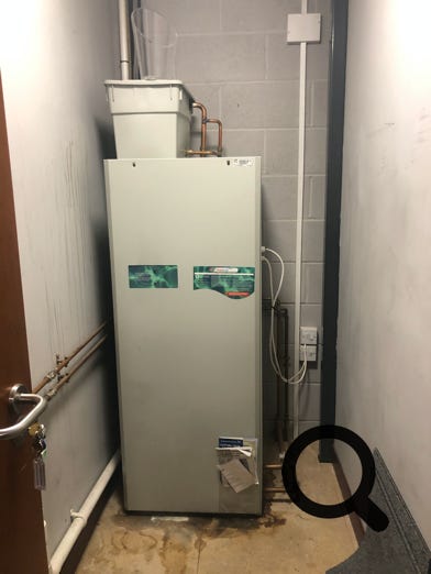 Pulsacoil 2000 in Guildford, leaking and prior to replacement