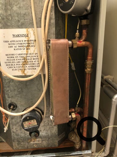 Pulsacoil plate heat exchanger being replaced.